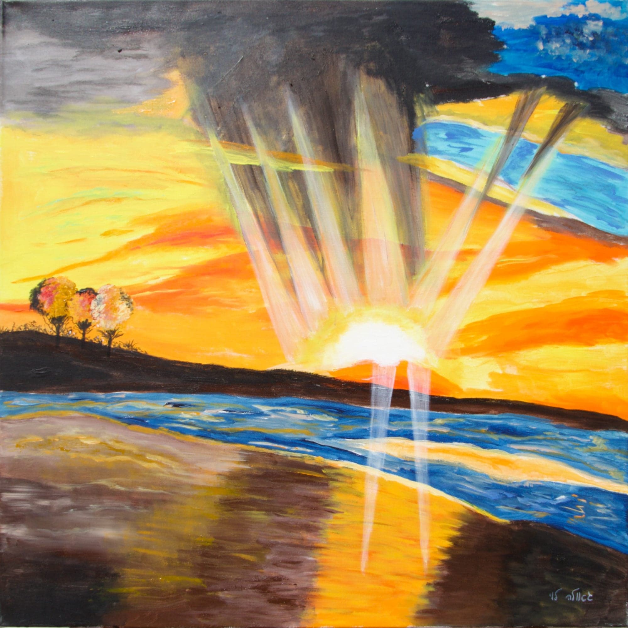 A blazing sunset breaks through a dark storm cloud in rays of light over an orange sky, blue waves and a dark shore with three small trees.